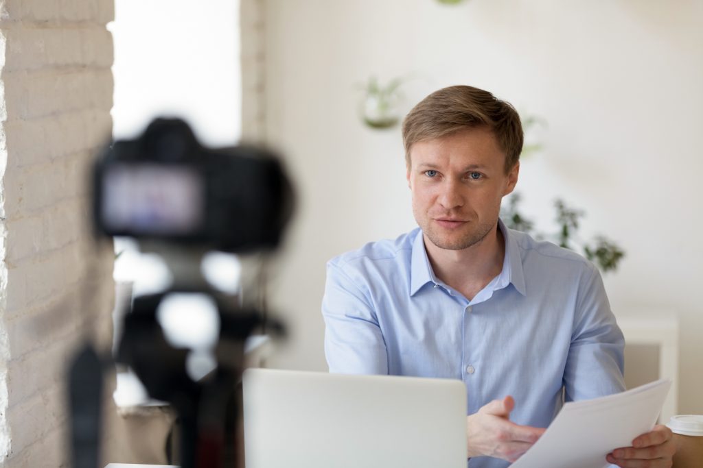 Guy-on-Camera-giving-a-presenation