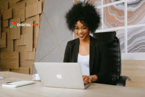 woman smiling at computer